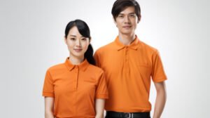 Male and female staff wearing orange polo t-shirt uniforms in Malaysia